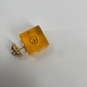 Handmade yellow D&D dice pin